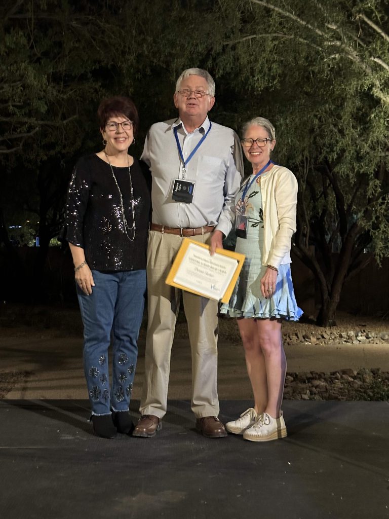 Dennis Steiner receives his award